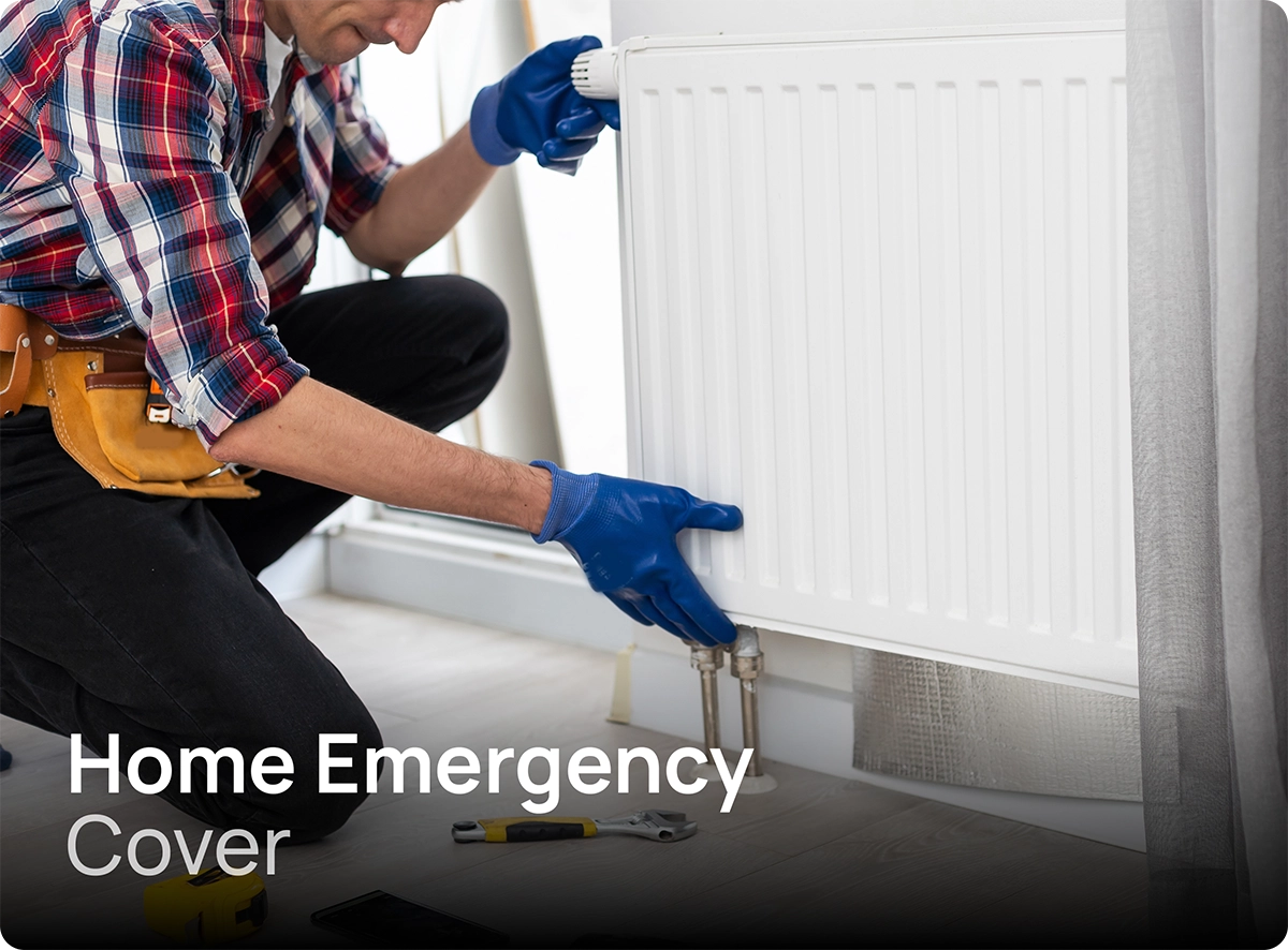 home-emergency-cover Man repairing a radiator in a bright living room, typical scenario protected by home emergency cover.