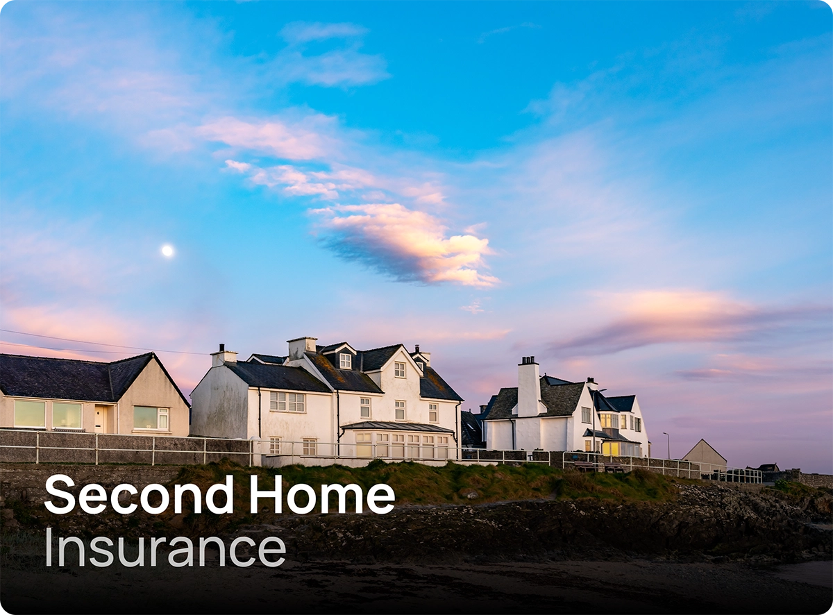 Row of three homes overlooking the sea which may be used as secondary properties requiring second home insurance
