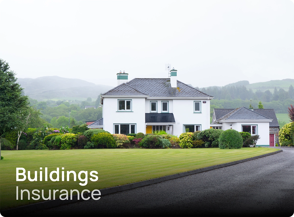 Large white house with spacious garden in Co. Kerry, Ireland, covered by buildings insurance.
