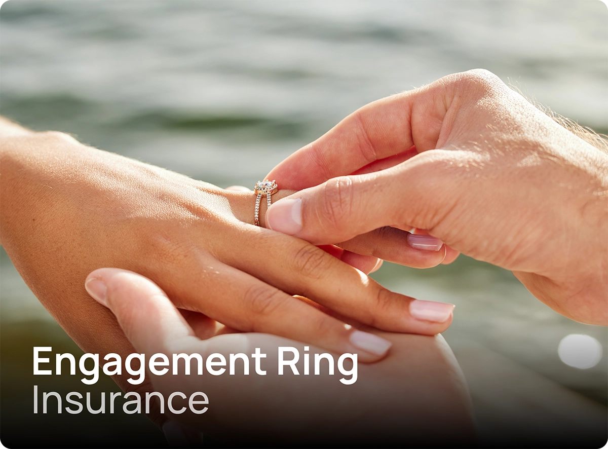 engagement-ring-insurance Outdoor marriage proposal with an engagement ring being placed on ring finger