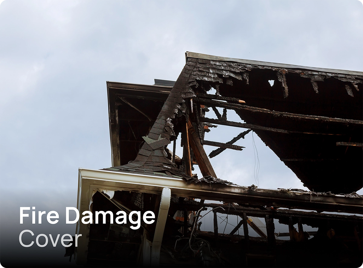 A burnt roof of a house caused by fire damage.
