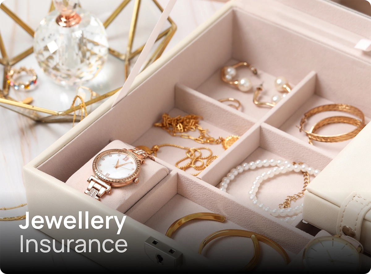 Box containing gold bracelets, watches and earrings to be protected by jewellery insurance
